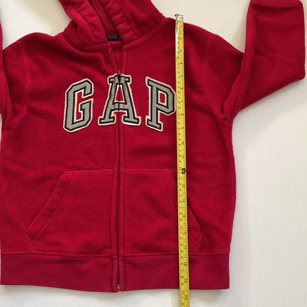 GapKids red hooded, full zip sweatshirt with gray, blue & white GAP.  Size small